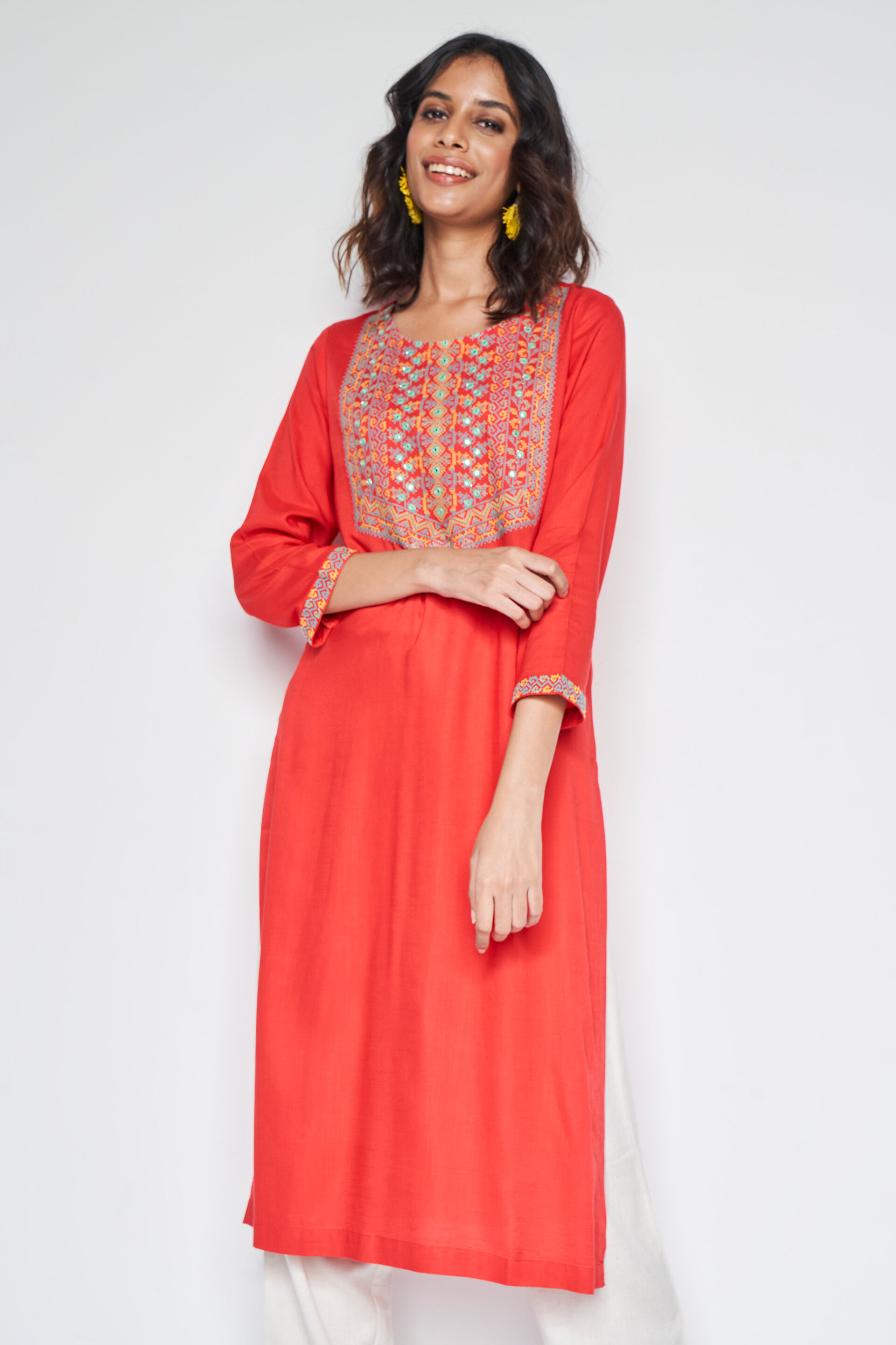 Buy our Orange Solid Straight Kurta online from globaldesi.in SC FW23GA046KURYS